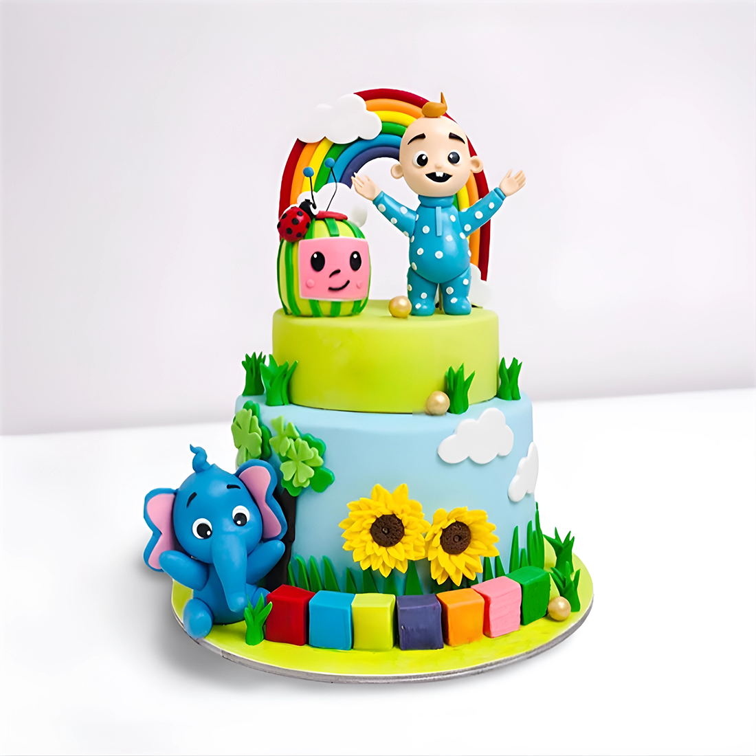 Elephant Decorated Cake With A Cocomelon Twist