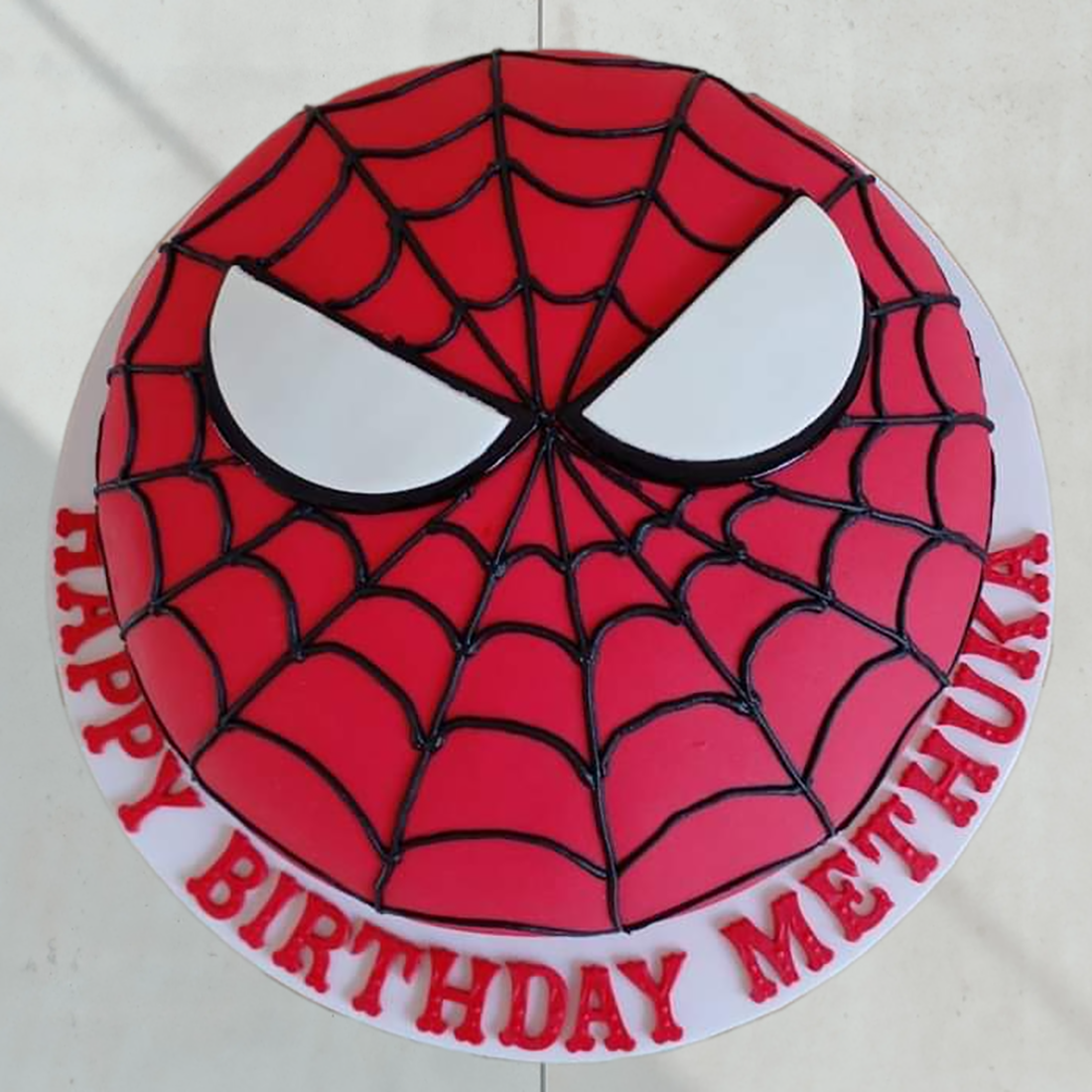 Spiderman face fondant cake