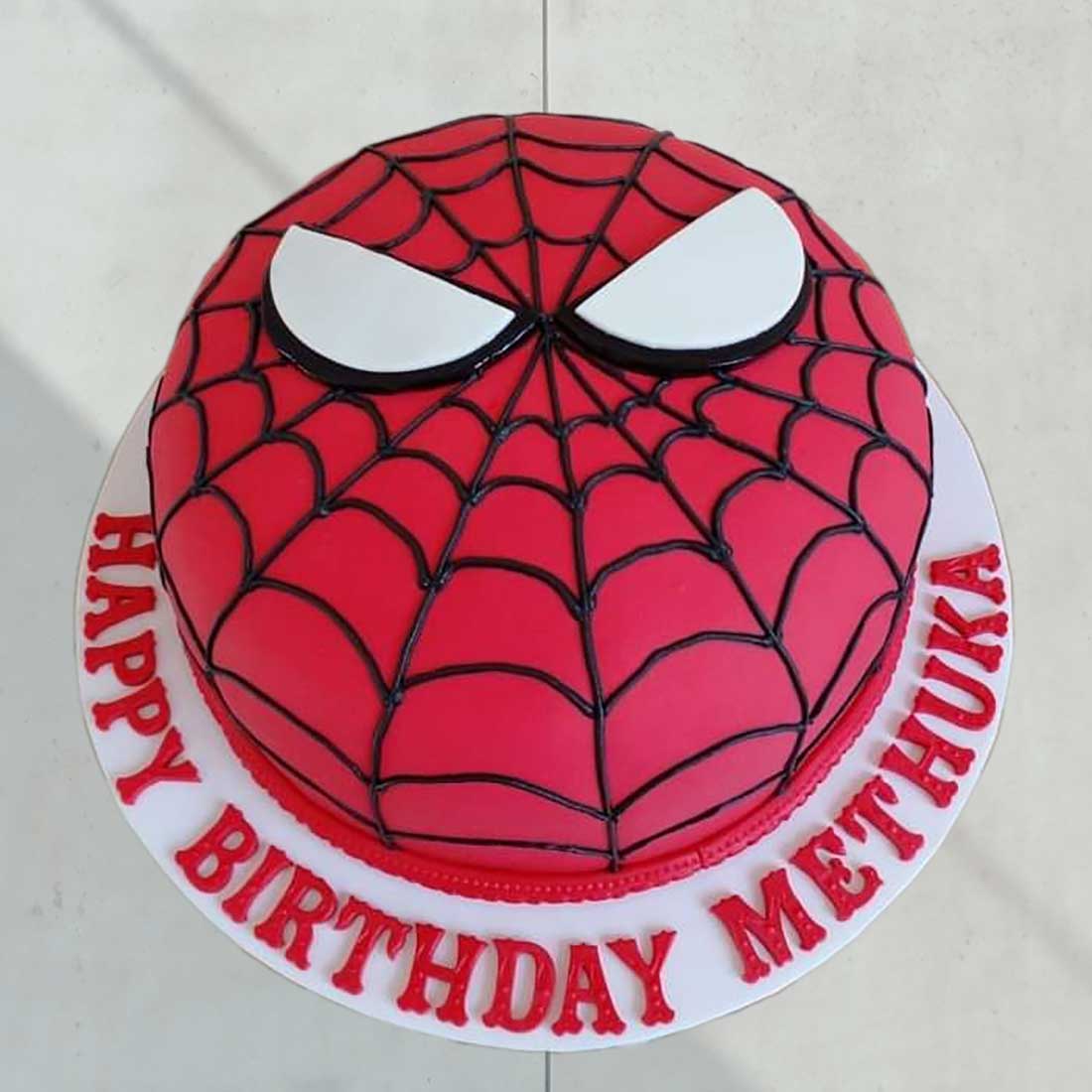 Spiderman face fondant cake